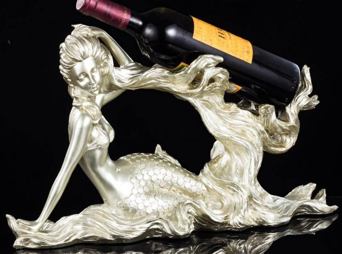 Beautifully designed mermaid  wine bottle holder. resin