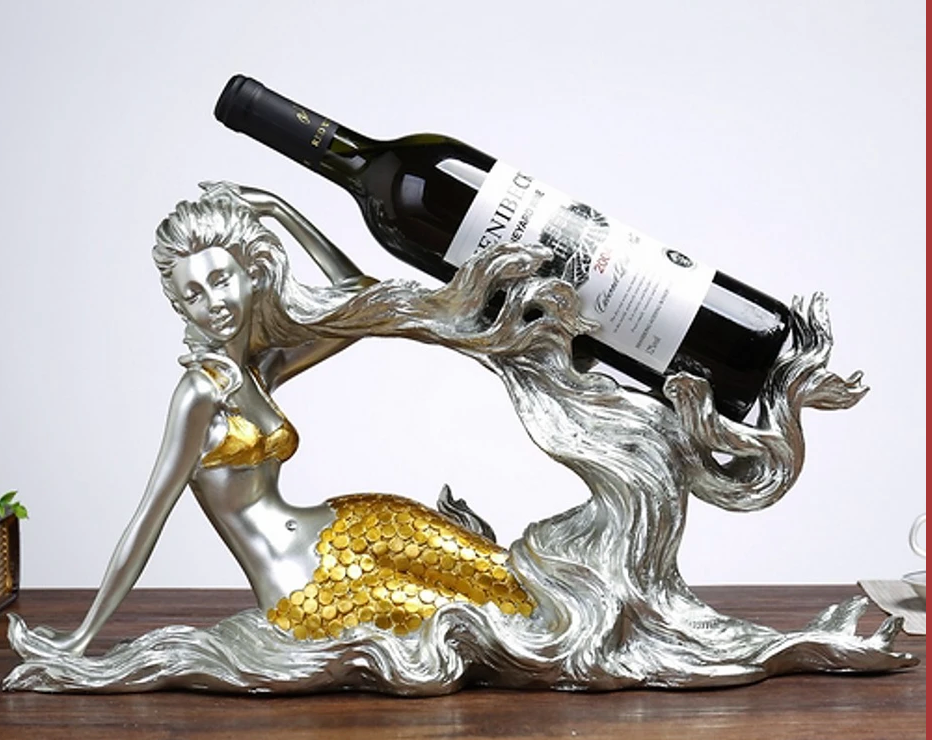 Beautifully designed mermaid  wine bottle holder. resin